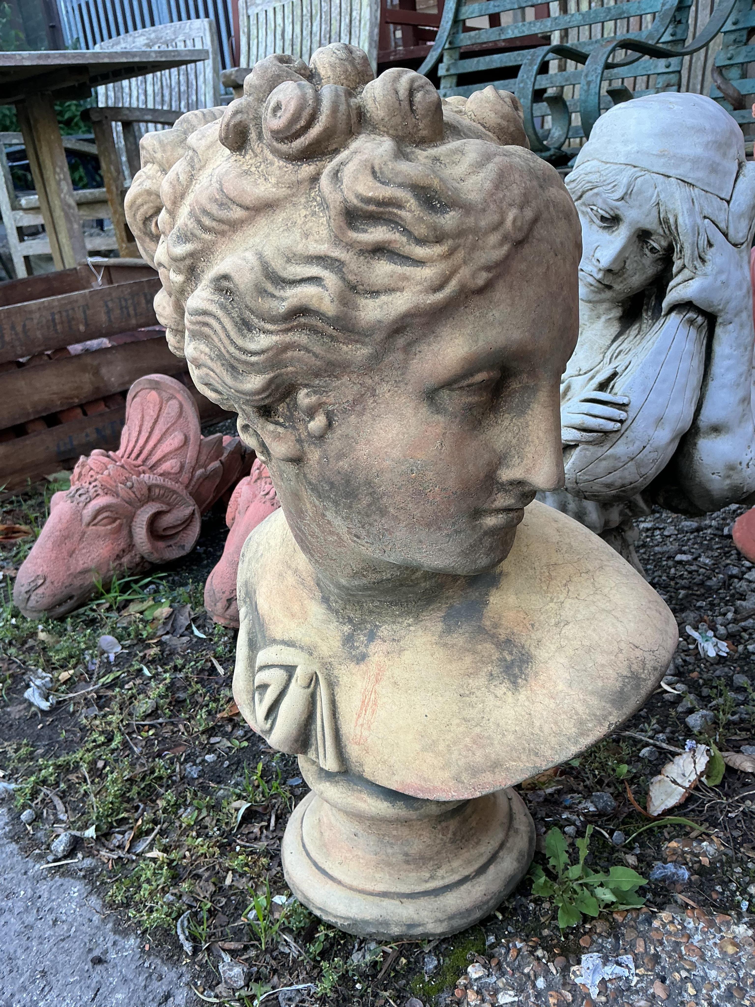 Three stone classical female busts, largest height 52cm